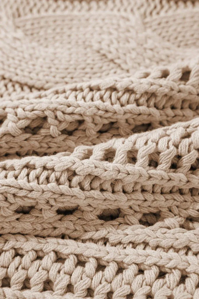 HALLOWED CABLE KNIT SWEATER